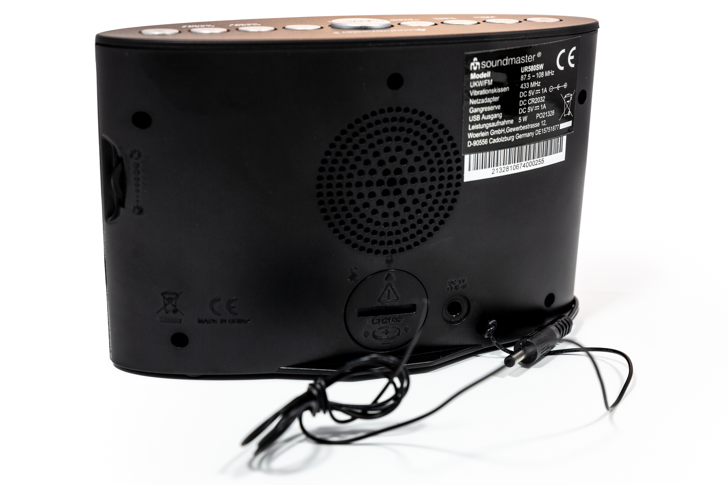 FM clock radio for aurally handicapped people with wireless wake-up vibrating pad